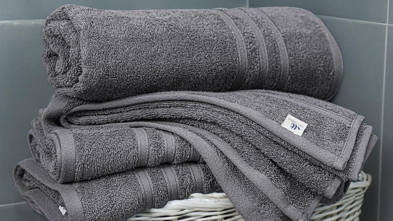 Folded Tens Towels in woven basket