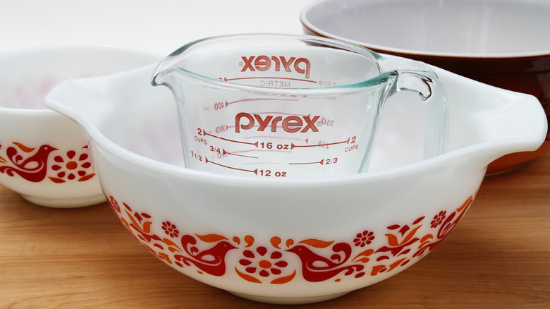 Pyrex mixing bowl with a Pyrex measuring cup inside