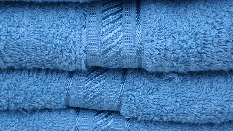 A woven dobby border of towel with design