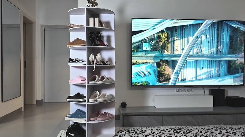 FWTI DEAL Rotating Shoe Rack Tower holding shoe collection in a living room