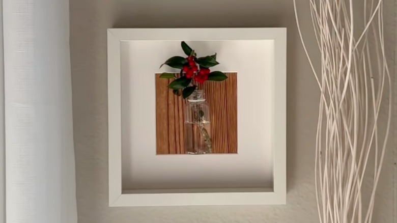 IKEA frame DIY with plant cutting displayed