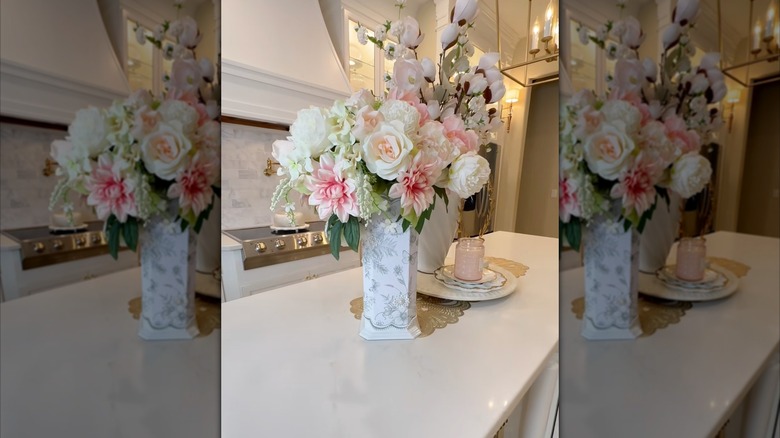 flowers in a DIY toilet paper holder vase