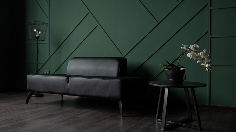 Living room with emerald green walls