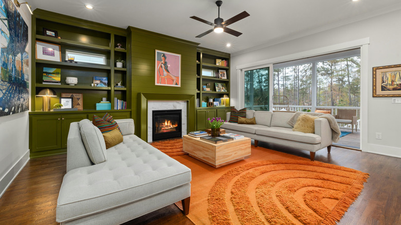 A black bookcase with a matching window seat