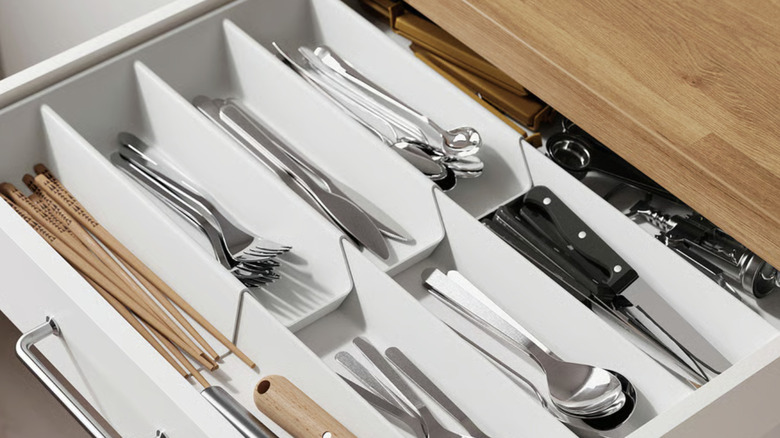 expandable VARIERA flatware tray in a kitchen drawer