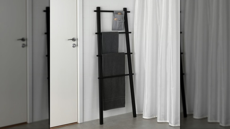 IKEA VILTO towel stand with towels hanging from it
